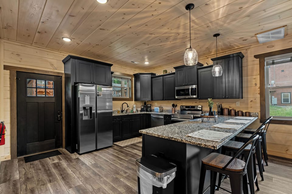Fully equipped kitchen with stainless steel appliances