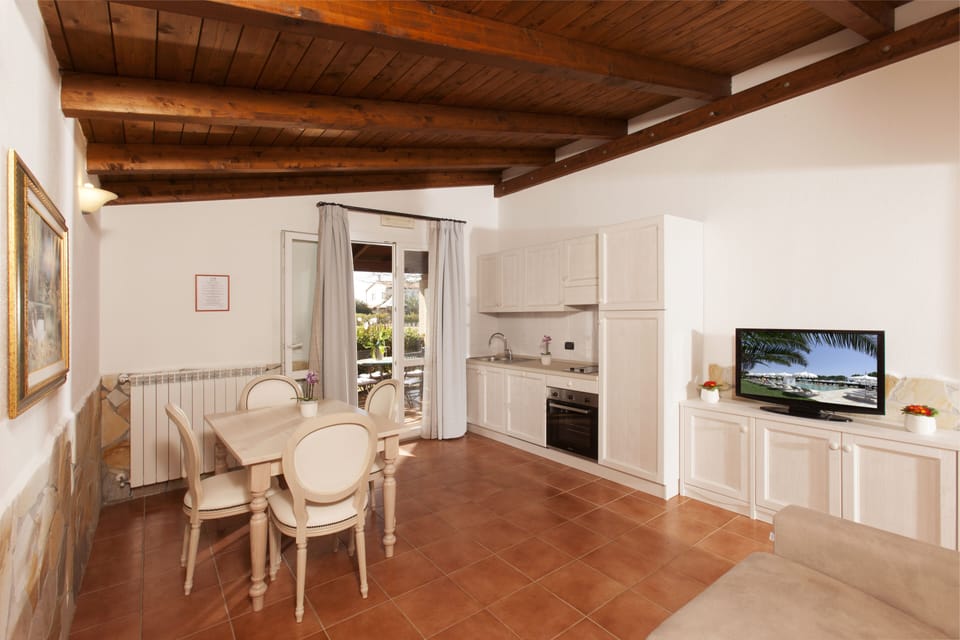 Two Bedroom Apartment for 4 people | Living room | 32-inch flat-screen TV with cable channels, TV