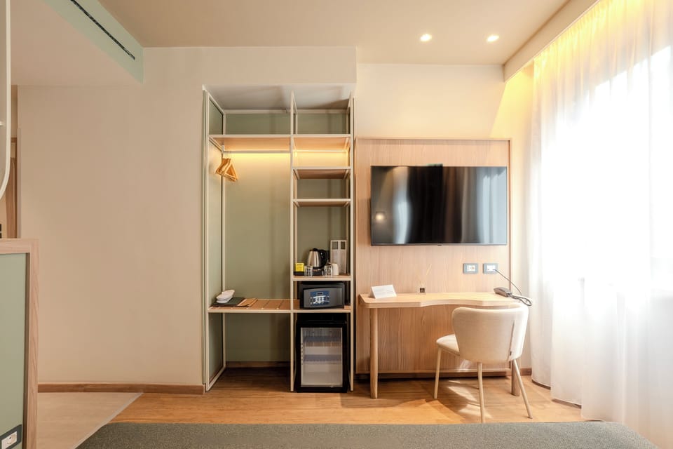 Deluxe Room, Multiple Beds, Non Smoking | Premium bedding, minibar, in-room safe, desk