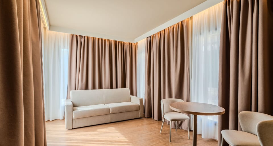 Deluxe Room, Multiple Beds, Non Smoking | Premium bedding, minibar, in-room safe, desk