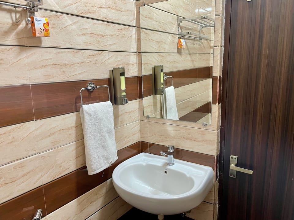 Shower, towels, soap, shampoo