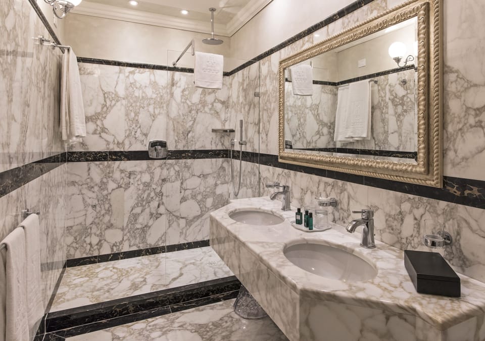Suite | Bathroom | Shower, rainfall showerhead, designer toiletries, hair dryer
