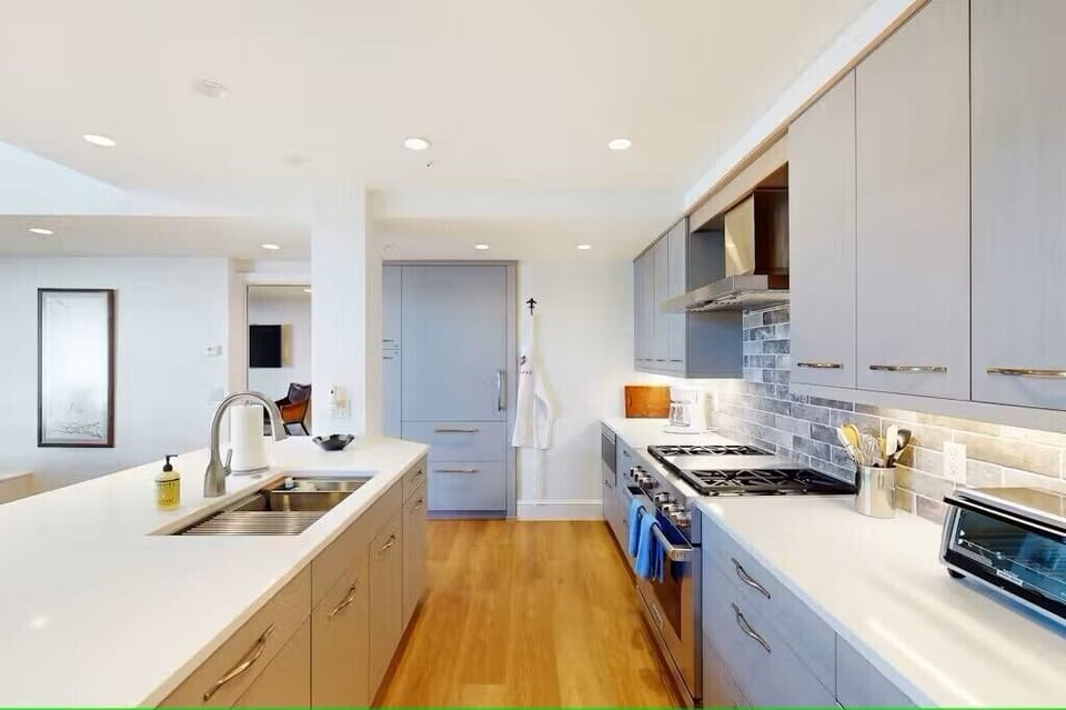 Kitchen - Updated and fully appointed kitchen with a gas range and stainless steel appliances
