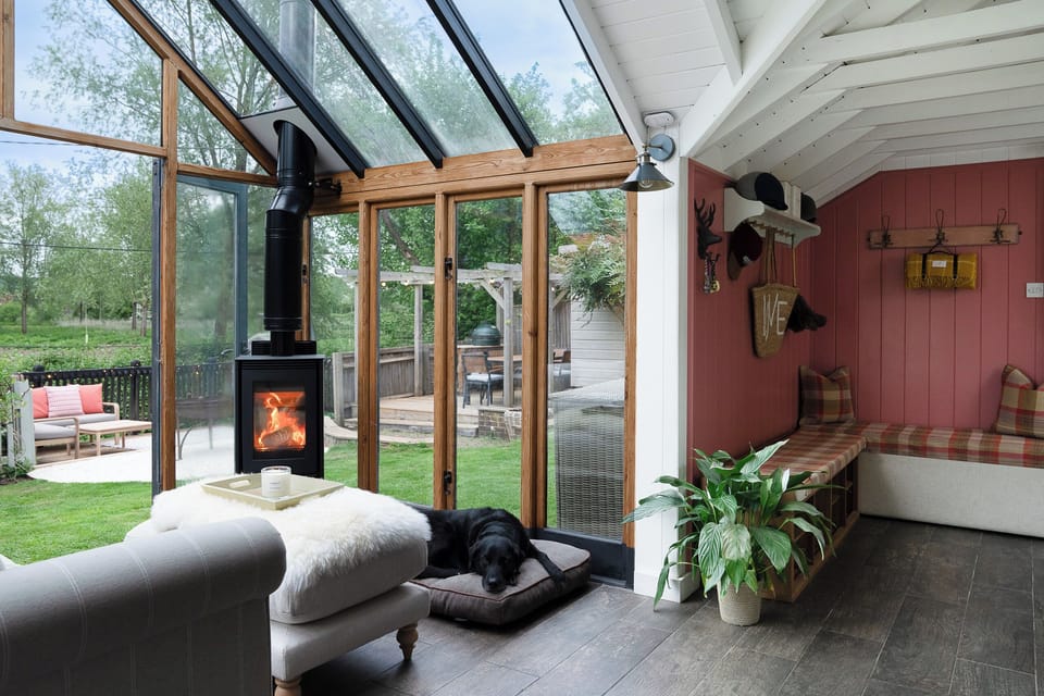 Sunny conservatory with woodburner