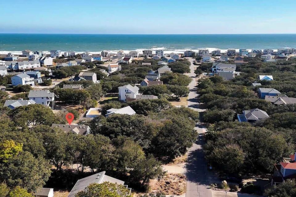 Experience luxury beach living at its finest in this updated 4-bed, 4-bath home in Duck, NC! ️ Step right onto the sand from your doorstep and cool off in your private pool afterwards. Book your dream Outer Banks getaway today! #DuckNC #BeachHouse 