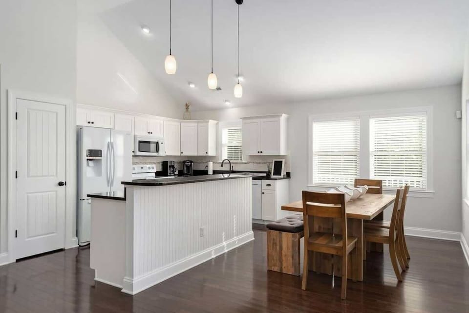 Wide-open kitchen and dining area.