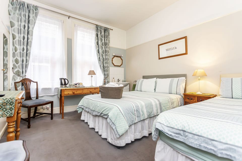 Standard Triple Room, Shared Bathroom | Free WiFi, bed sheets