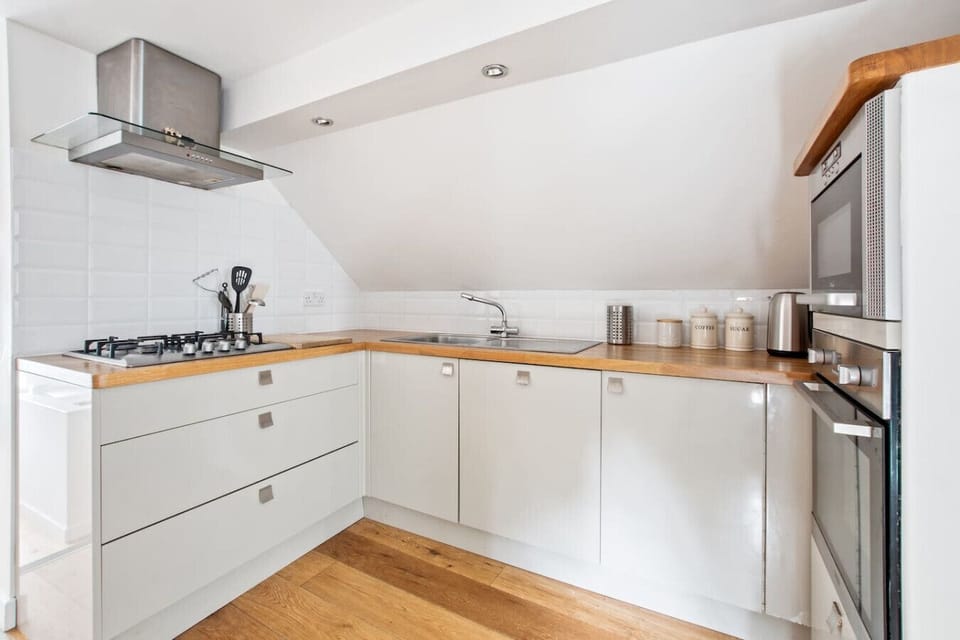 Sleek countertops and modern appliances in the kitchen