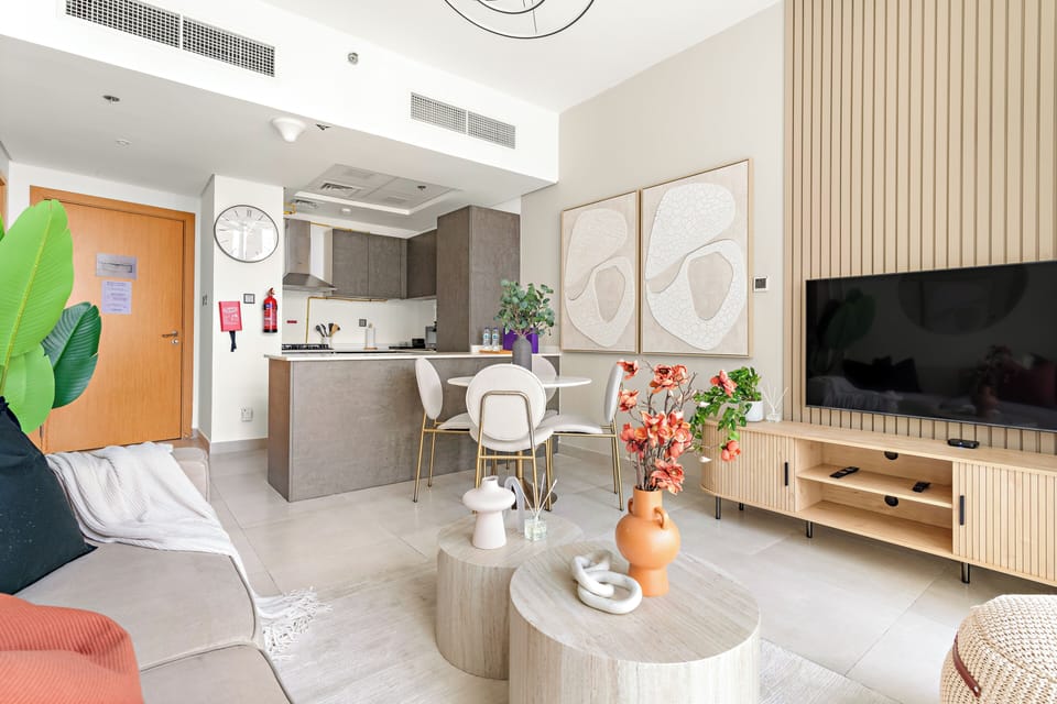 Deluxe Apartment | Living area | 50-inch Smart TV with digital channels