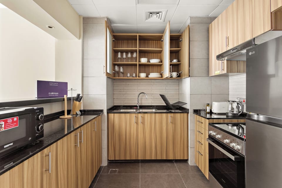 Family Apartment | Private kitchen | Coffee/tea maker, fridge, microwave, oven