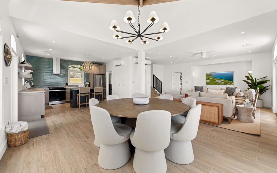 Spacious, ocean-view lounge with vaulted ceilings, Smart TV, board games, and room to unwind. Perfect for lazy mornings or movie nights.