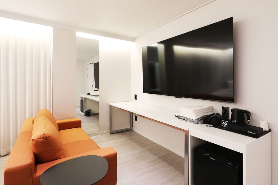Family Suite, Multiple Beds, Non Smoking, Private Bathroom | Down comforters, laptop workspace, blackout drapes, free WiFi