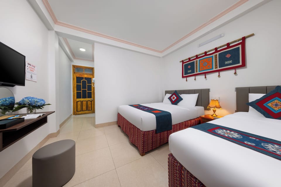 Deluxe Triple Room | Desk, laptop workspace, free WiFi