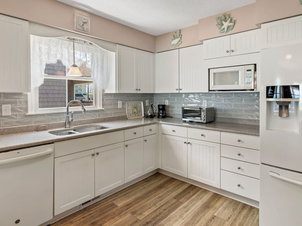 The Kitchen with modern appliances is perfect for meal prep!