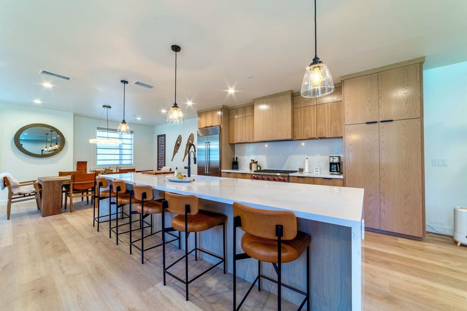 Large kitchen island with bar seating for 5.
