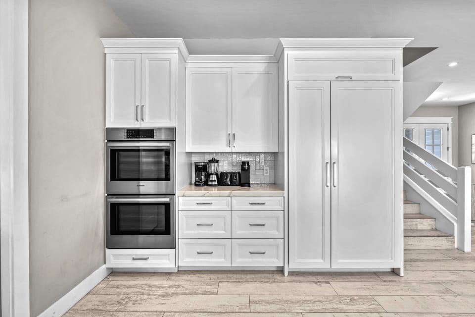 Double oven and coffee bar.