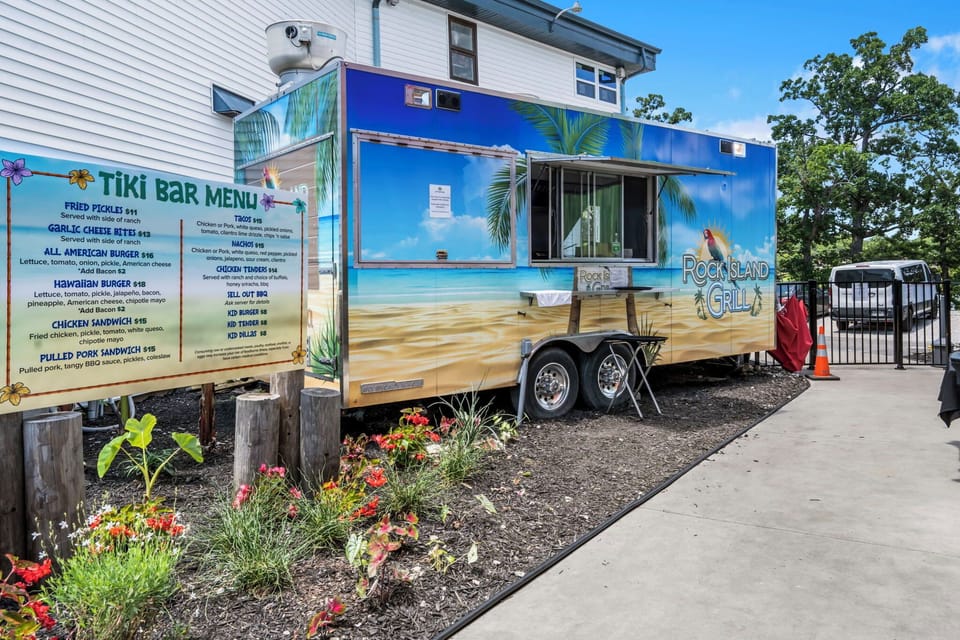 Grab & go with island flavor! Swing by the Rock Island Grill food truck for burgers, tacos, and fun bites — perfect for fueling up between pool dips and lake adventures.