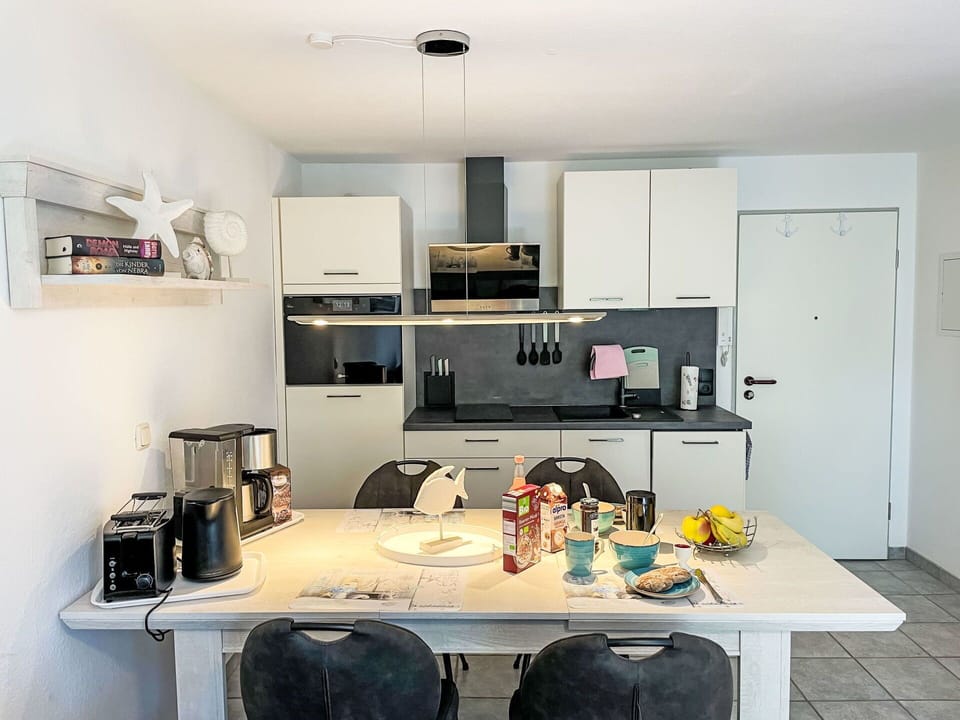 Furniture, Kitchen, Interior Design, Kitchen Appliance, Countertop, Flooring, Ceiling, Cabinetry, Floor, Home Appliance