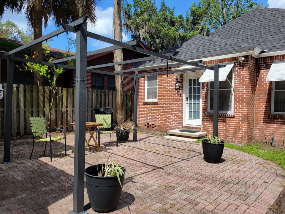 This shared courtyard is an open space to enjoy the warm Florida air.