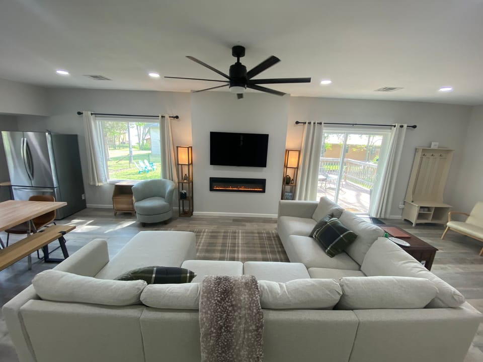 Living Room with fireplace and smart Roku TV. 
