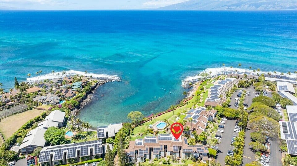 Stunning aerial view of Napili Point perched along Maui's dramatic coastline