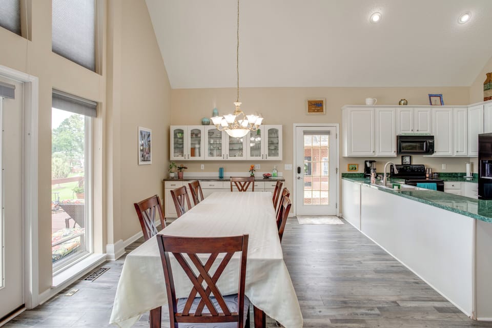 Dining Area | Dishware & Flatware | Central A/C & Heat | 1st Floor