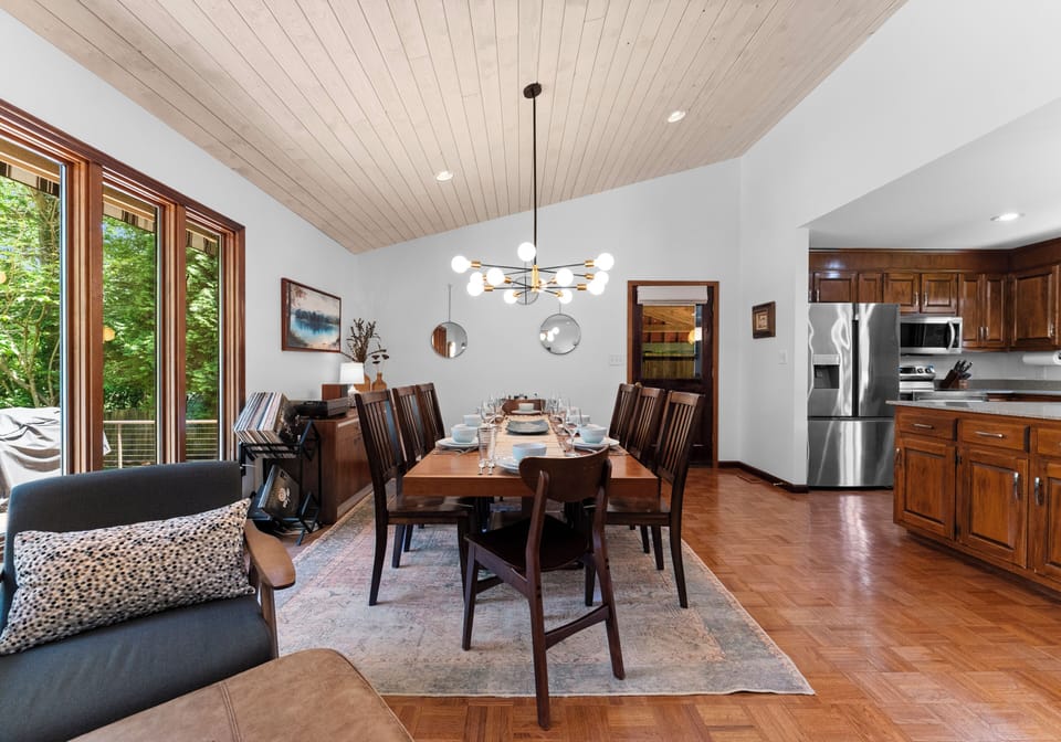Elegant dining space under beautiful pendant lights.