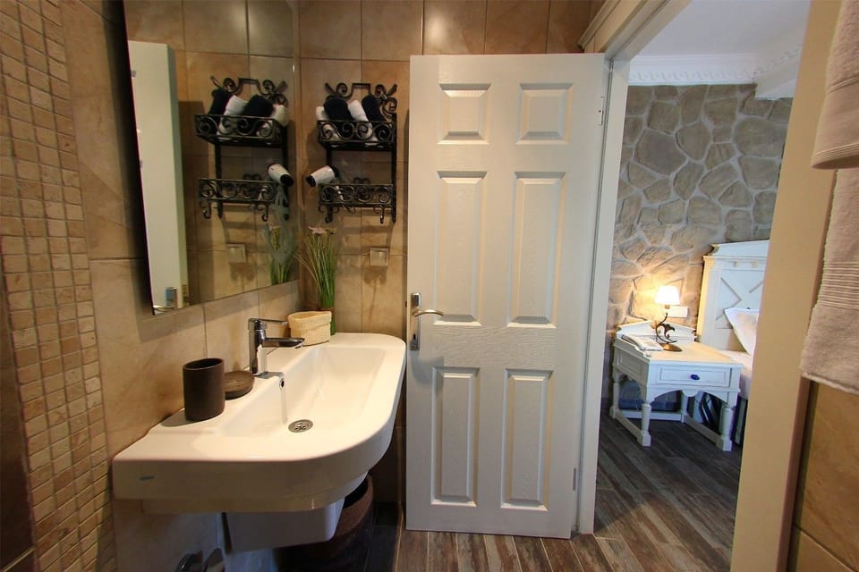 Shower, free toiletries, hair dryer, slippers