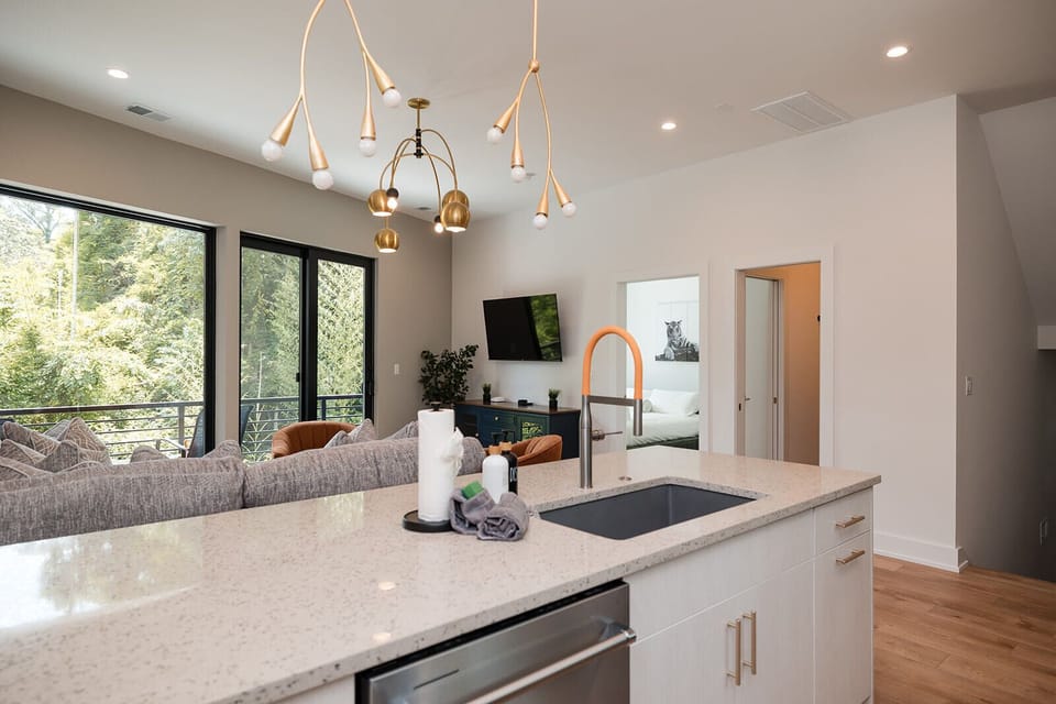 The fully stocked kitchen includes cookware, essentials, and everything needed for preparing meals and hosting guests in style.