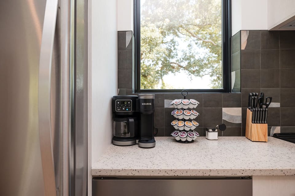 Start your mornings with fresh coffee and enjoy a relaxing start to your Wilmington getaway in this upscale townhome.