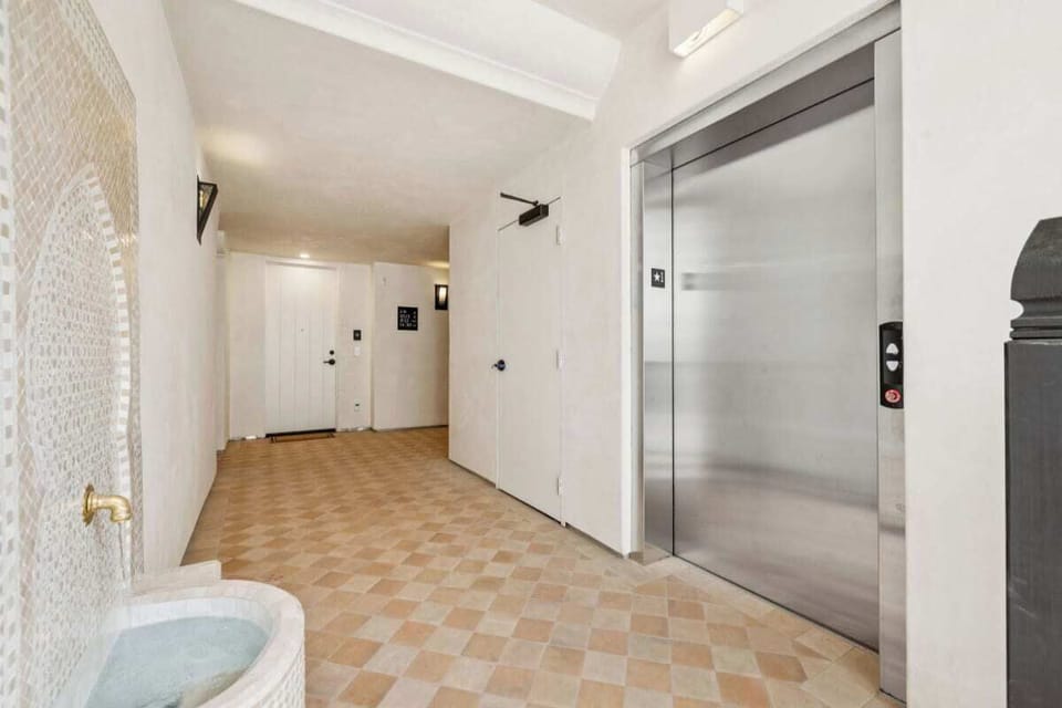 Elevator: parking to second floor.