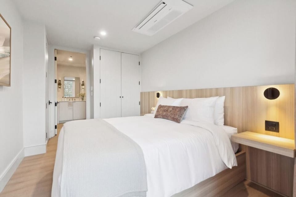 Queen-size bed, sleeps 2, and 65" Hisense TV 