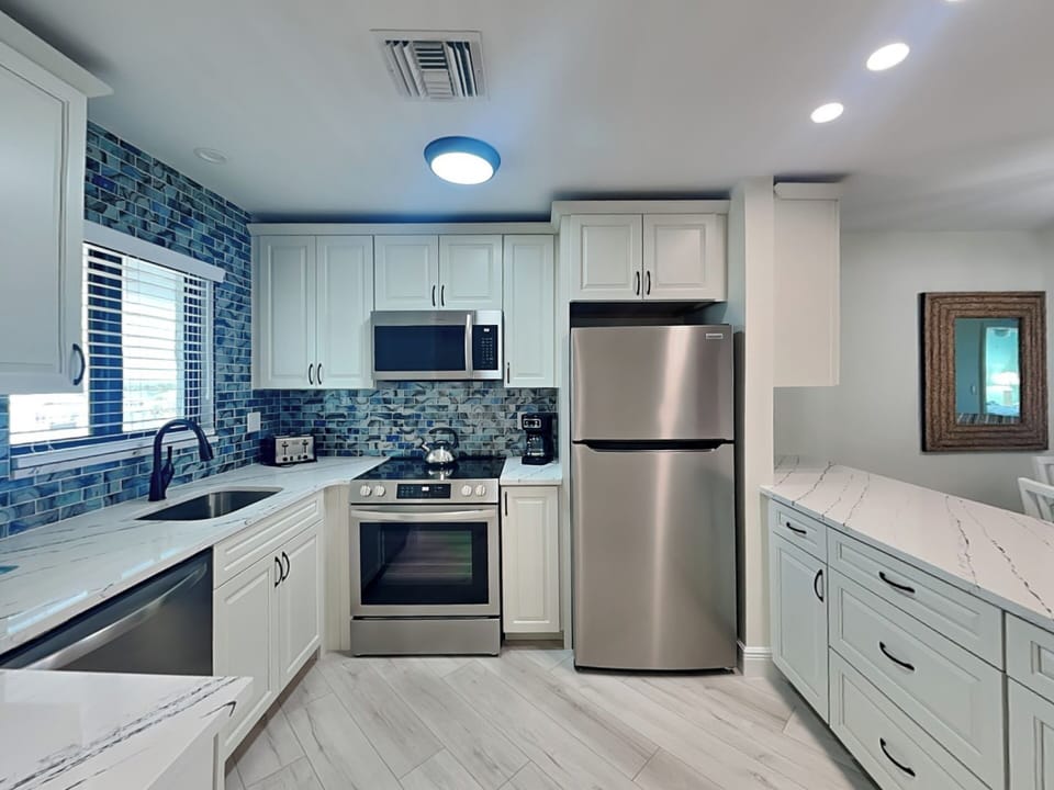 Fully Equipped Kitchen with Stainless Steel Appliances