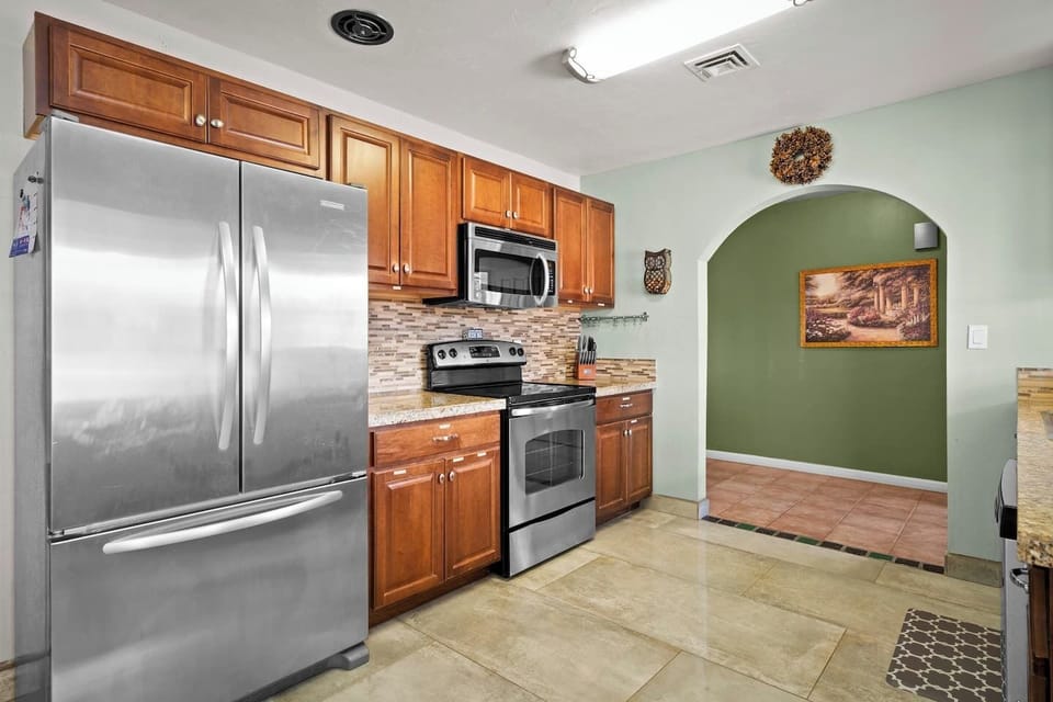 This recently updated kitchen is fully stocked with anything you'd need to make a homecooked meal!