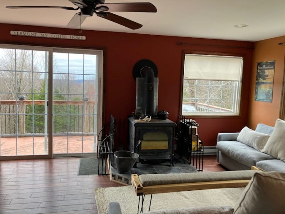 Living room sliding doors open to deck and some of the best views in the area