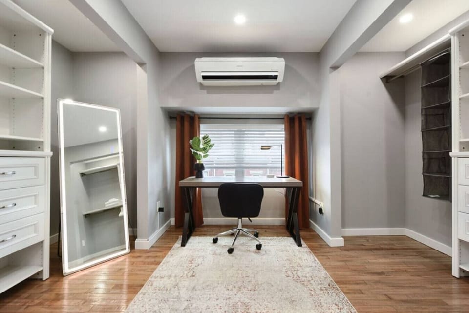 Dedicated workspace and closet organization for a comfortable stay.