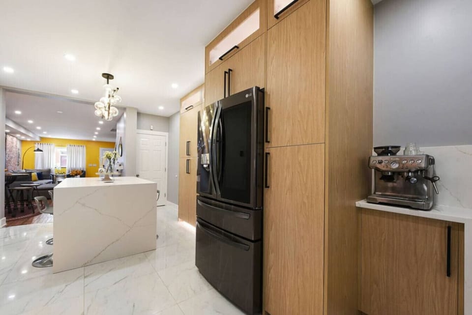 Contemporary kitchen with high-end appliances, perfect for any culinary need.