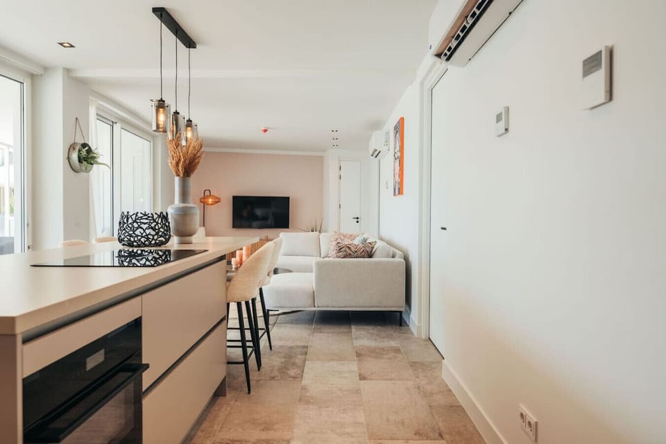 Cozy, stylish, and full of natural light—this space is made for kicking back and enjoying every island moment.