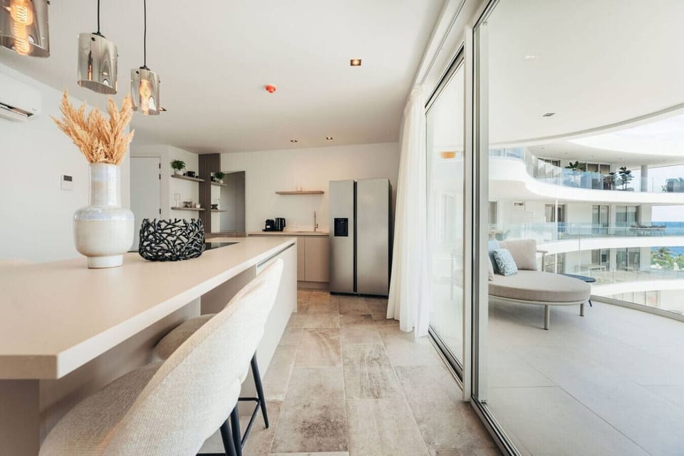 Brew your morning coffee, slide open the doors, and step straight into the breeze—this is island living at its best.
