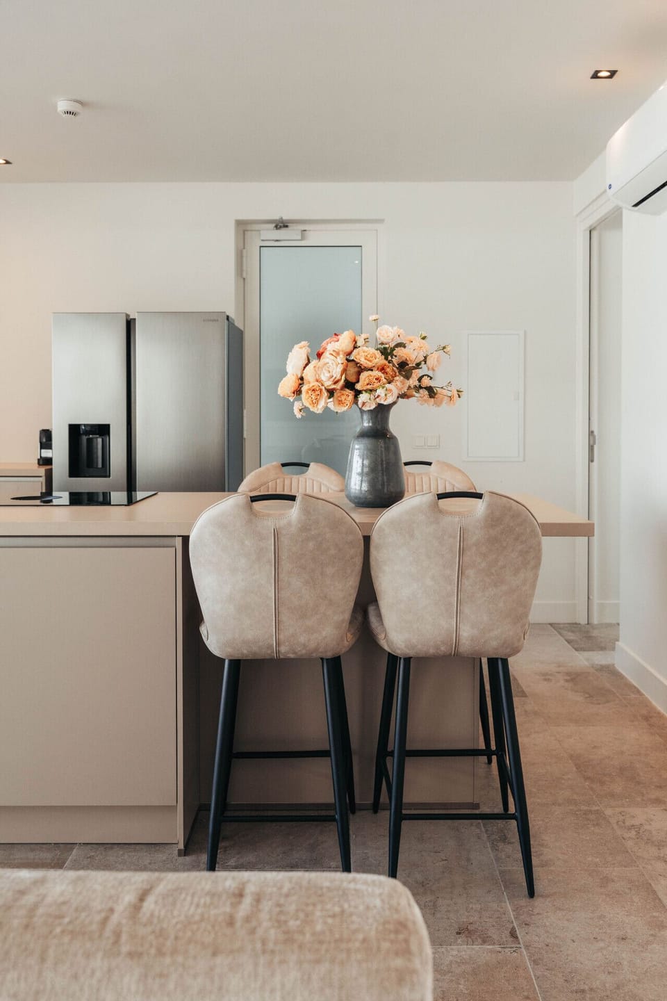 Start your day right at this cozy kitchen island—fresh coffee, warm light, and space to gather, unwind, or just enjoy the moment. Welcome home to ONE Mambo.