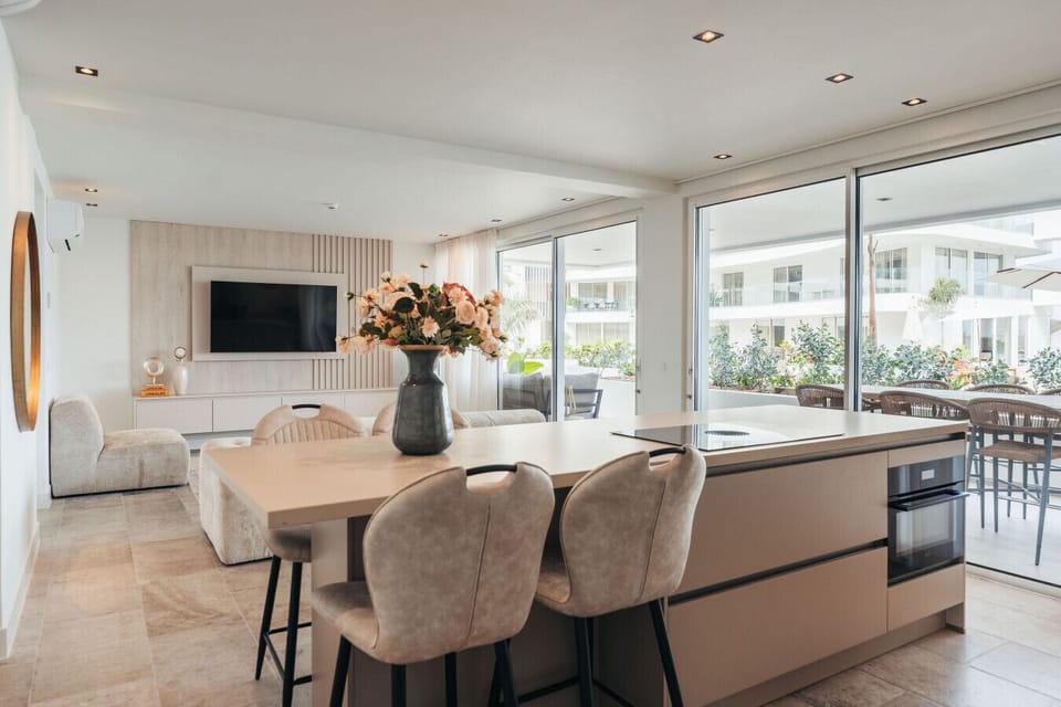 Welcome to the cozy living area of ONE Mambo 2!  This space is perfect for hanging out with friends or just chilling after a day of exploring. The open layout and natural light make it feel so inviting!