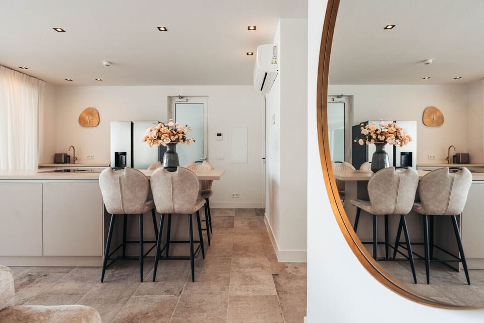 Start your day right at this cozy kitchen island—fresh coffee, warm light, and space to gather, unwind, or just enjoy the moment. Welcome home to ONE Mambo.