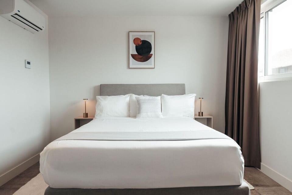 Sink into soft sheets and pure comfort—this cozy bedroom is calling you to kick back, relax, and enjoy every second of your stay.
