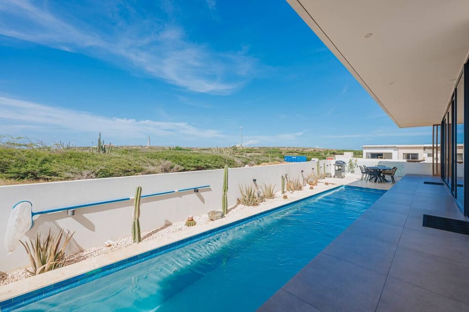 Start your day with a swim in the private pool or unwind on the patio while enjoying the open island views.