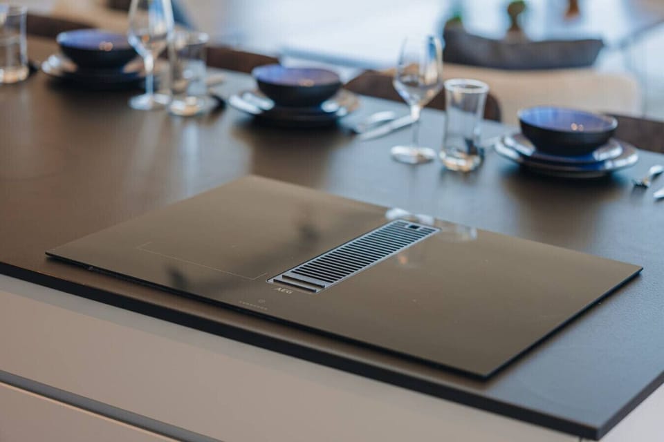 The fully equipped kitchen features premium appliances and everything you need to prepare meals during your stay.