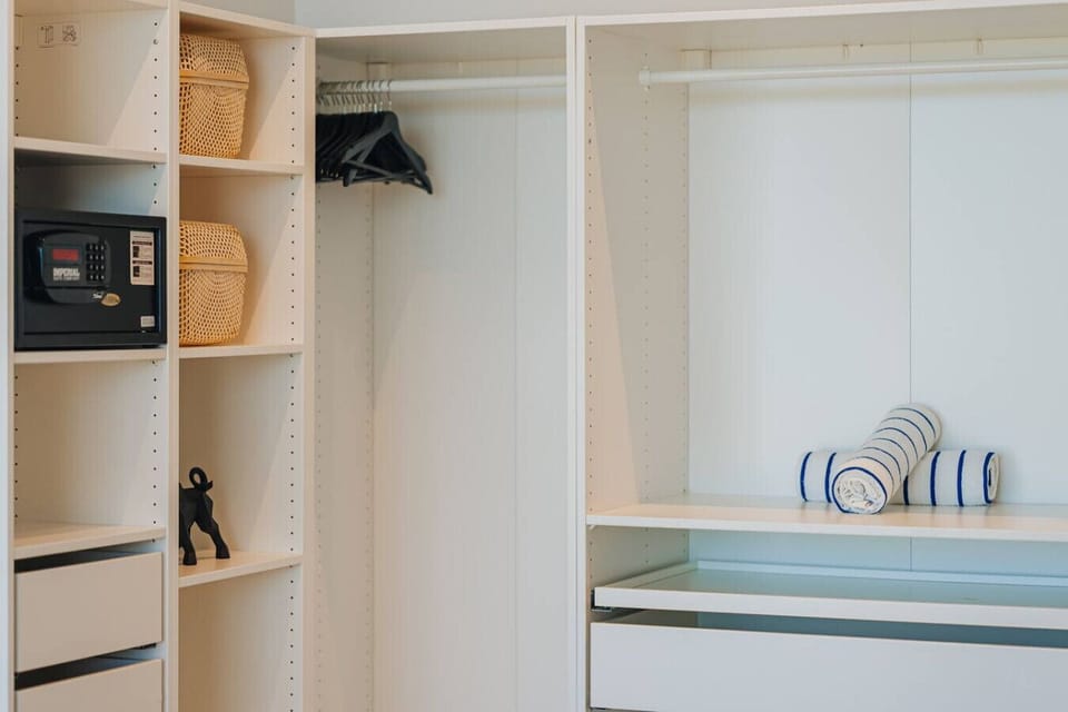 Unpack and settle in with ample hanging space, drawers, shelving, and an in-room safe for added convenience.