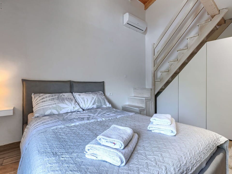 Interior Design, Furniture, Floor, Bedroom, Flooring, Bed, Room, Ceiling, Bedding, Lighting