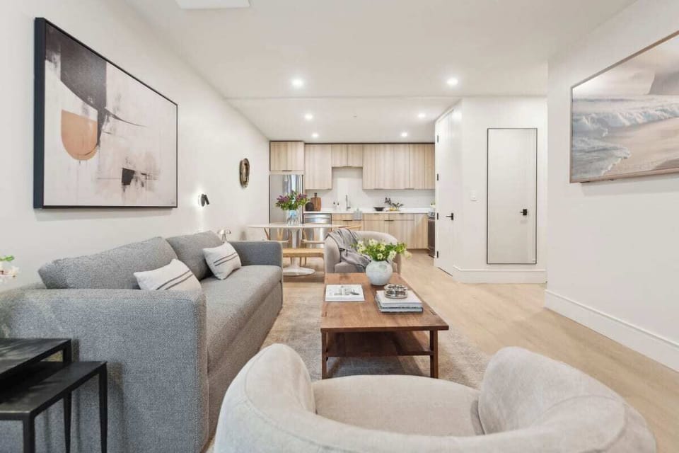 Living room with queen sleeper sofa, 65" QLED CanvasTV with Art Mode