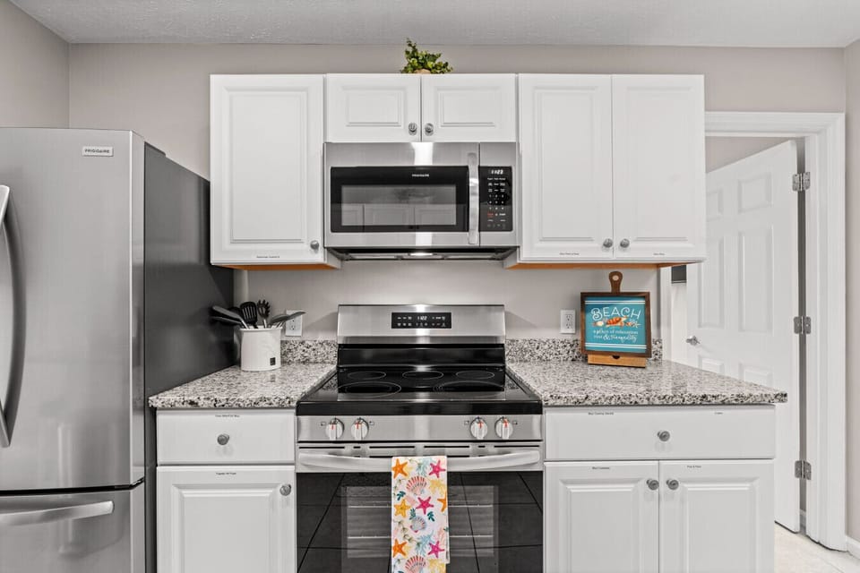 Brand new top of the line stainless steel appliances throughout.