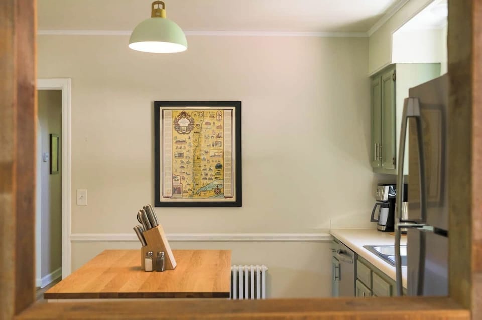 With classic finishes and thoughtful amenities, this kitchen blends charm and practicality - plus a dishwasher to make cleanup a breeze.